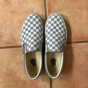 Vans checkered slip ons in light blue
